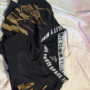 Her Universe Black and Gold Athletic Shorts
